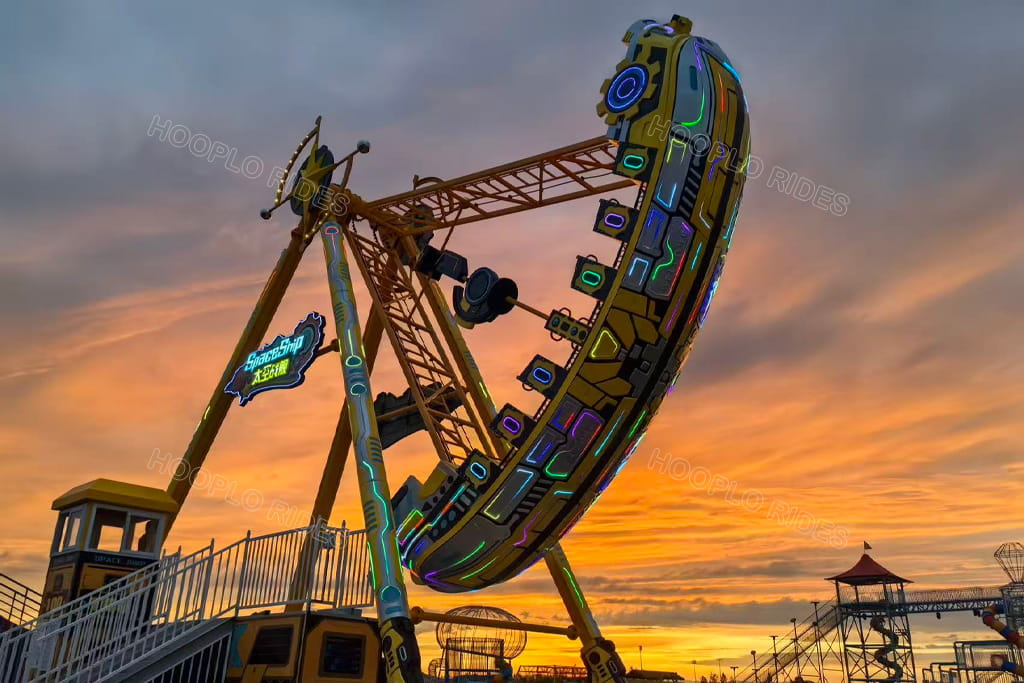 Space-themed pendulum amusement park ride, part of our summer promotion for traditional rides